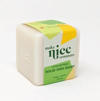 Unscented solid dish soap bar made of biodegradable ingredients, beige color, textured surface, from Make Nice Company