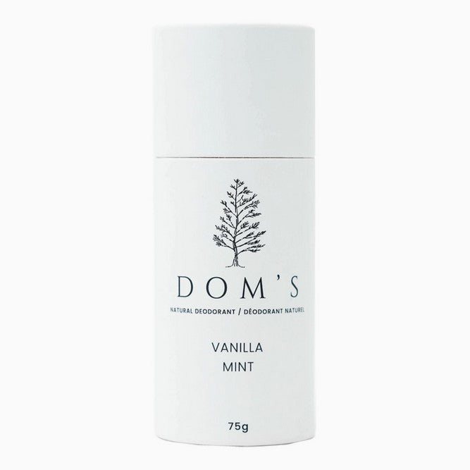 Dom's Deodorant Stick in vanilla mint scent, creamy white plastic container with a black twist-up base, 3-inch tall