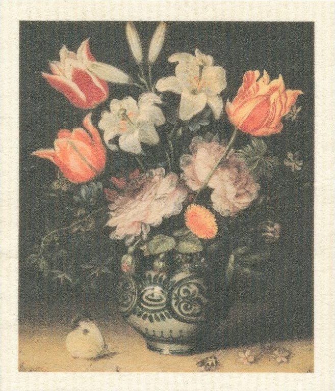 Vase with colorful mixed flowers, porcelain with a smooth glossy finish, accompanied by a More Joy Swedish dishcloth with