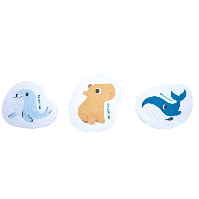 Plantish Wet and Wild Pop Up Sponges featuring colorful silicone seals, soft cellulose texture, and compact whale and hippo