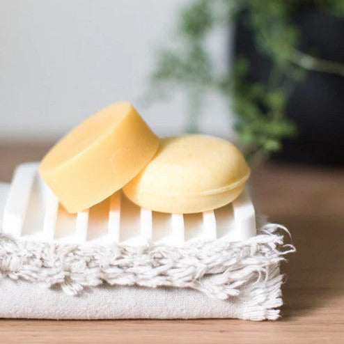 Close-up of the textured silicone surface with drainage holes, highlighting flexibility and non-slip grip on the soap tray.