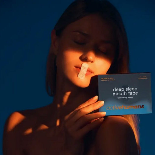 Close-up of the Deep Sleep Mouth Tape mini 40-pack showing textured white adhesive surface and teal backing for secure