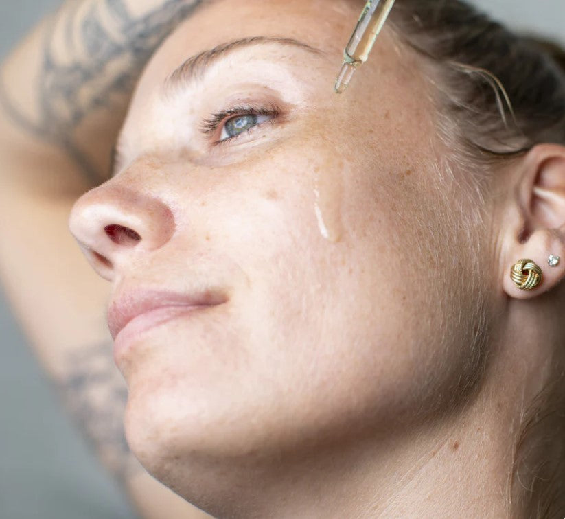 Close-up of Leaf Shave Calming Serum bottle neck showcasing the sleek design and subtle scent label detail.