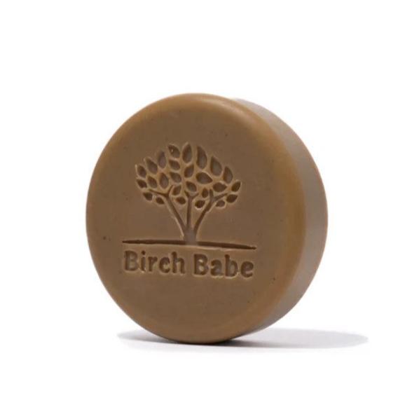 Birch Babe Woodsy Jay shave bar with textured woodgrain surface in natural brown and beige tones