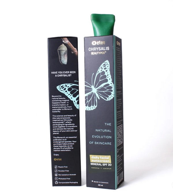 Close-up of the Daily Facial Sunscreen tube showing smooth, lightweight texture and subtle citrus scent on a clean surface.