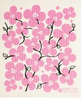 Close-up of the textured, absorbent surface of Wet It! Swedish Cloths showing the woven material and vibrant blue color