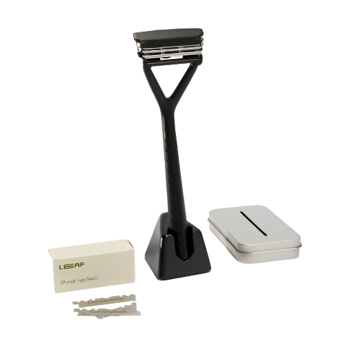Leaf Black Razor Kit with stainless steel razor handle, black textured grip, and matching black blade cartridge in compact