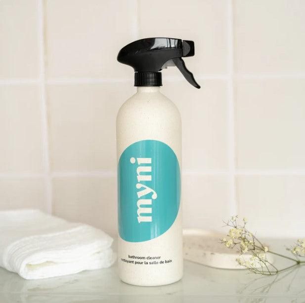 Close-up of the textured wheat straw body and narrow mouth opening of Myni Reusable Spray Bottle, highlighting eco-friendly