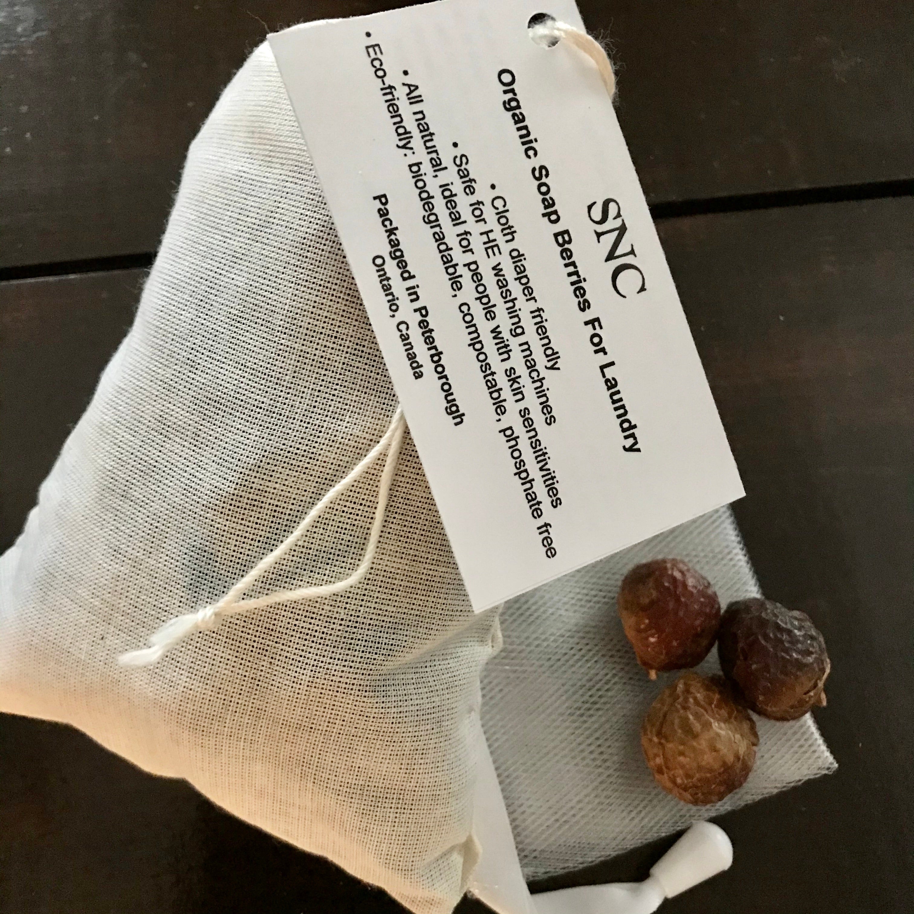 Close-up of bundled organic soapberries with visible hand-crafted texture and natural fiber twine, showcasing eco-friendly