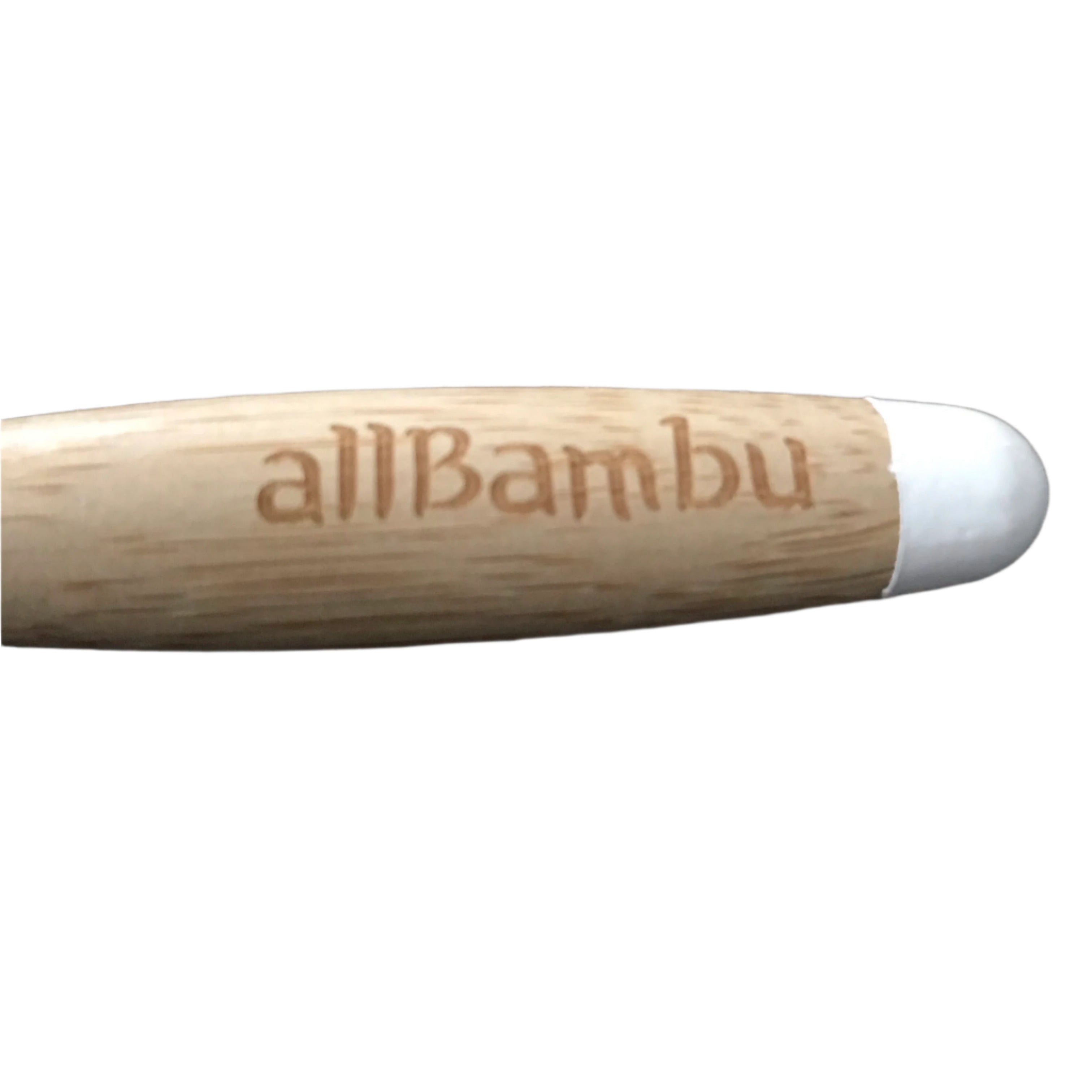 Close-up of the allBambu toothbrush handle displaying natural bamboo texture and engraved logo detail from a top-down angle.