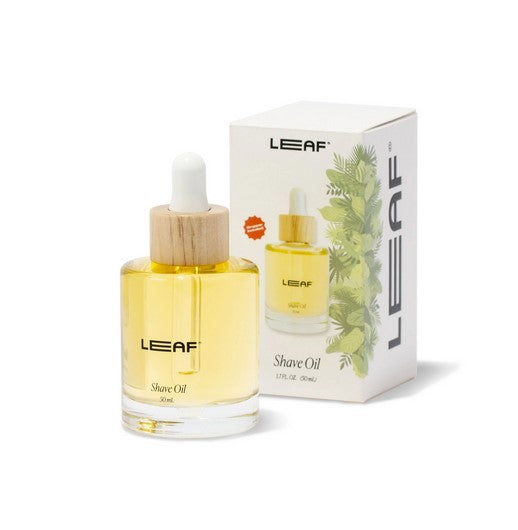 Leaf Shave Oil bottle with clear, fragrance-free liquid and black pump dispenser on white background