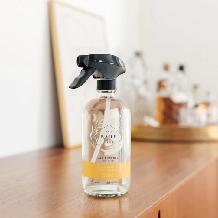 Close-up of Lemon Tea Tree All Purpose Cleaner label highlighting natural ingredients and eco-friendly packaging design.