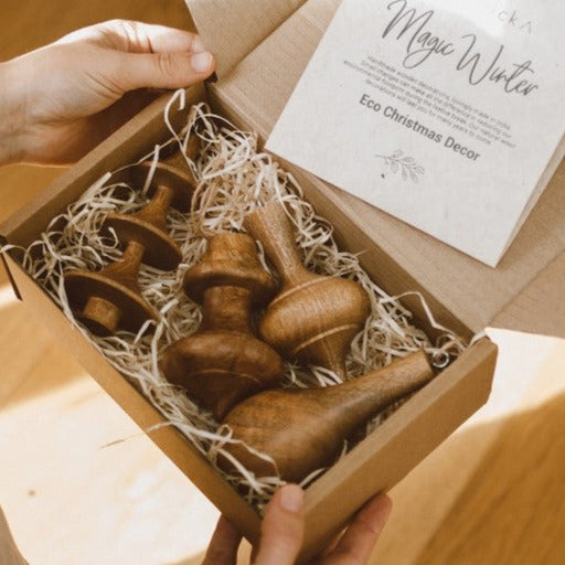 Set of 4 handcrafted wood ornaments with natural finish, eco-friendly design, measuring 3 inches each, by Goldrick Natural