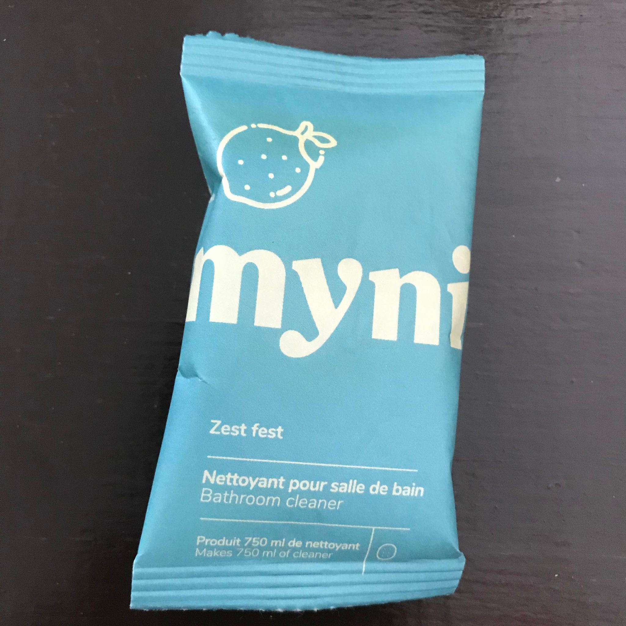 Close-up of Myni Bathroom Cleaning Tablets label highlighting eco-friendly ingredients and clear dosage instructions