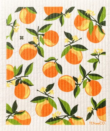 Close-up of the textured orange blossom-scented sponge cloth’s bright orange color and tightly woven cellulose fibers for