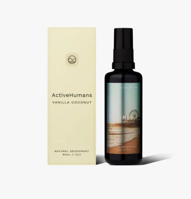 Close-up of the spray nozzle and textured vanilla coconut scent mist on the Active Humans deodorant canister.