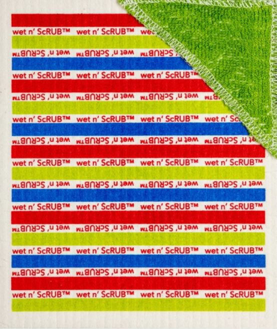 Close-up of the textured, absorbent Swedish cloth showing embossed branding and vibrant stripe pattern for cleaning use