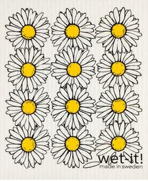 Close-up of the textured, woven surface of a yellow Swedish dishcloth showcasing its absorbent, zigzag pattern detail.